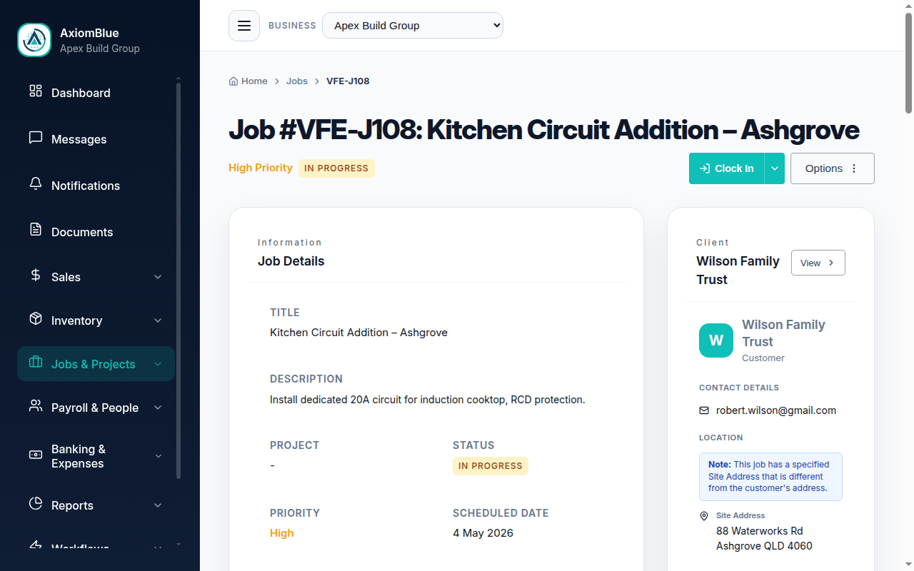 AxiomBlue job management software showing a job with time tracking, materials, status, and live cost summary
