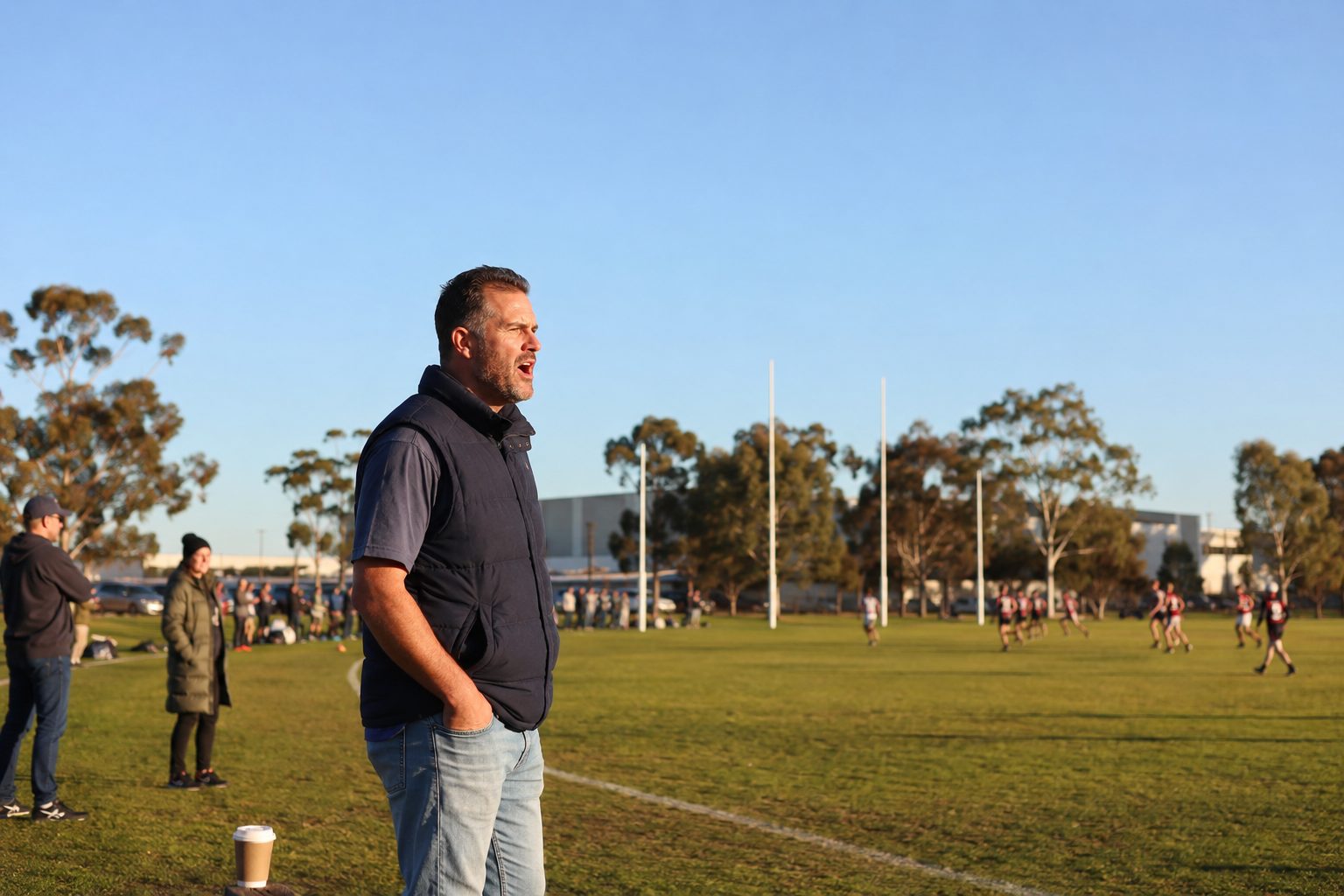 Business owner at a kid's footy game, time returned to you